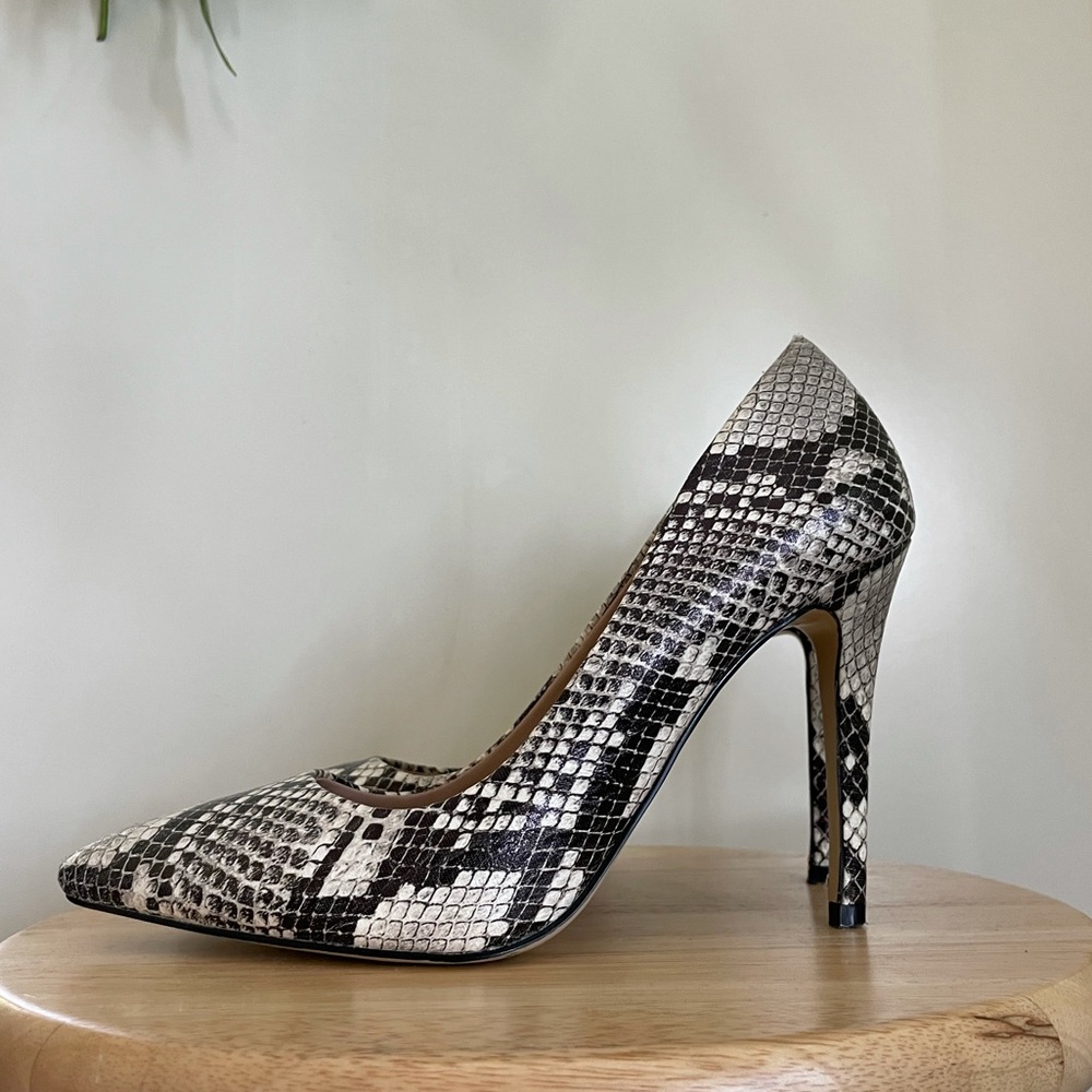 Snake print stiletto heels. Size 6.5. Lightly worn. From Nordstrom Rack.